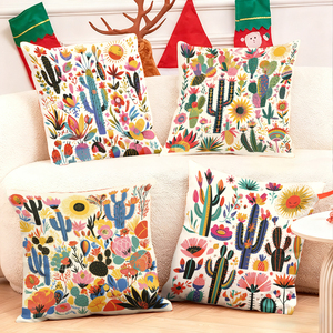 カラフルなサボテンと花模様のクッションが居心地の良いリビングルームのソファを飾ります。 - Product Image 1