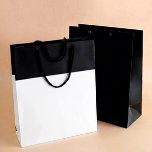 Classic Patterned Gift Bag with Gold Twisted Handles and <b>Black</b> <b>Tissue</b> <b>Paper</b>, Art <b>Paper</b> Gusseted Side Bag for Gift & Craft Use - Product Image 1