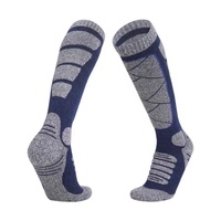 Vente en gros de chaussettes de ski unisexes tricotées d'hiver de haute qualité pour l'extérieur avec logo sur la manchette