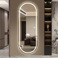 Miroir de salon ovale LED moderne et minimaliste avec halo frontal et commande tactile pour salon de coiffure, barbier, hôtel, vente en gros