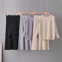 Ensemble décontracté en maille côtelée à col rond anti-plis pour femme, haut à manches longues coupe décontractée printemps/automne et jupe midi taille haute douce