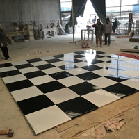 Conception personnalisée Granit noir et marbre blanc Carreaux de sol en pierre à damier