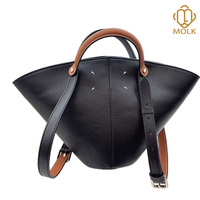 Sac seau portable en cuir de vachette pleine fleur pour femme, collection Printemps, avec deux poignées, longue bandoulière et pieds métalliques
