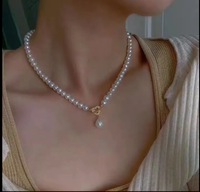 Collier classique intemporel avec fermoir en forme de cœur
