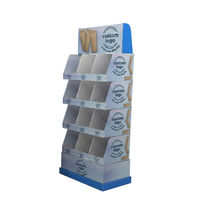 Présentoir en carton écologique pliable sur mesure à 4 étagères pour magasins de détail avec crochets pour dentifrice et brosse à dents