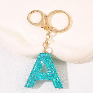 Chaîne de suspension pour tasse d'<span class=keywords><strong>eau</strong></span> et porte-clés à vingt-six lettres, style luxe léger et simple, pendentif de sac pour femme au design original - Product Image 1