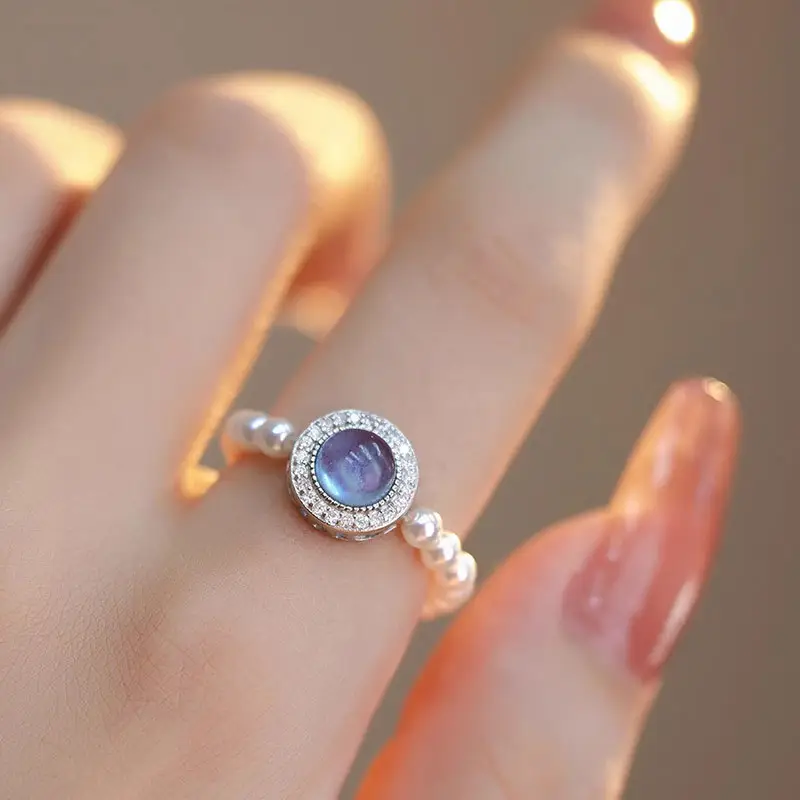แหวนพลอยเครื่องประดับสีฟ้าหินอัญมณีทอปาซ 925 ผู้ผลิตธรรมชาติสีฟ้าที่ละเอียดอ่อนน้ําจืดแหวนพลอยกลม