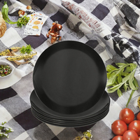Assiettes de table rondes en mélamine noire mate, personnalisables avec logo, écologiques et modernes, pour la restauration en gros