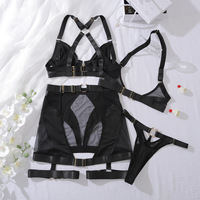 Deep Love Lingerie de luxe en résille transparente noire, ensemble 3 pièces sexy pour femme, comprenant porte-jarretelles, jupe de style 'spanking' et string érotique