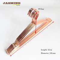 Cintre en fil métallique brillant or rose peu encombrant pour armoire pour salle de bain et salon
