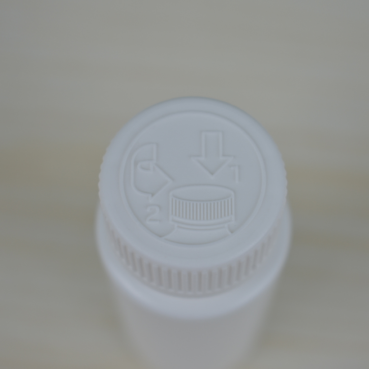 Small batch empty 60ml 5% minoxidil bottle with child resistant cap