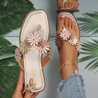 Nouvelles sandales plates à fleurs marguerites pour femmes, tongs décontractées pour la plage et l'extérieur
