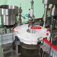Machine intégrée de remplissage de liquide rotatif de bouchon de bouteille inférieur de disque vibrant entièrement automatique, adaptée à divers produits liquides