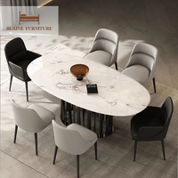 Table à manger ovale moderne de luxe BLAINE avec plateau en marbre naturel et base en acier, garantie de 3 ans, personnalisable