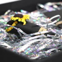 Papier de remplissage pour boîte cadeau en raphia métallisé doré brillant, avec coupe ondulée et paillettes