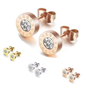 Pendientes de tuerca con cristales de imitación y engaste redondo, unisex, para uso diario - Product Image 1