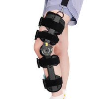 Attelle de genou articulée orthopédique respirante électrothermique réglable Taijie TJ-KM043 en nylon pour l'arthrose
