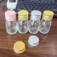 Bouteille pharmaceutique Bouteille en verre transparent 30ml 40ml 60ml avec bouchon Tampe Evidence 28mm pour boisson de jus de fruits