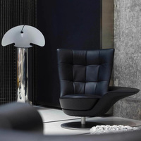 Canapé tournant italien moderne et léger de luxe avec rotation à 360 degrés en cuir véritable pour espaces lounge