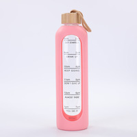 Nouvelle tasse en verre borosilicate de haute qualité 1000 ml/35,2 oz Grande capacité Parois épaissies Sans danger pour les aliments Portable en extérieur avec couvercle en bambou