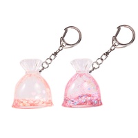 OEM Gantungan Kunci Cairan Akrilik Dompet Kustom Ornamen Bentuk Plastik Gantungan Kunci Glitter Floater untuk Grosir