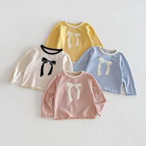 Новый весенний комплект для девочек 2026: корейский стильный топ с длинным рукавом и бантом, однотонная юбка-брюки, комплект из двух предметов - Product Image 3