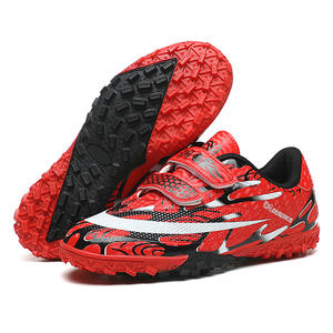 Chaussures <span class=keywords><strong>de</strong></span> football unisexes 2025 Nouveau modèle Grande <span class=keywords><strong>taille</strong></span> <span class=keywords><strong>28</strong></span>-39 Chaussures <span class=keywords><strong>de</strong></span> football d'entraînement Crampons TPU Gazon EVA Prix bas Bottes pour enfants et adultes - Product Image 1