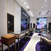 Vitrine de luxe incurvée en verre pour bijoux, présentoir de montres sur mesure, comptoir d'exposition de bijoux à LED pour boutique de détail