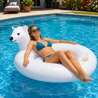 Bouée gonflable en forme d'ours polaire avec porte-gobelet pour la détente estivale en eau, idéale pour la plage et la relaxation des adultes