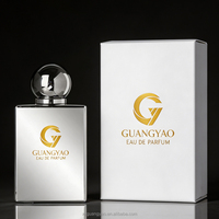 Flacon de parfum rectangulaire de luxe en verre de 50 ml, plaqué or et argent, avec pulvérisateur à sertir, couvercle sphérique en métal et emballage cadeau