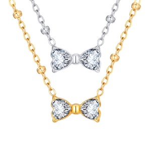 Collar gargantilla de acero inoxidable con circonita y corazón tallado estilo princesa para mujer, con colgante de nudo de corazón de cristal y engaste de canal, venta al por mayor - Product Image 1