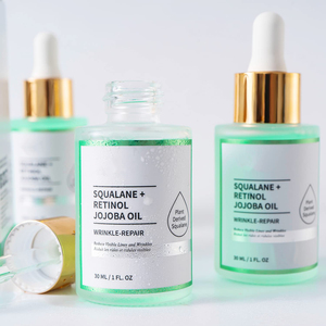 Logotipo personalizado orgánico Squalane Jojoba aceite para el cuidado de la piel brillo reparación hidratante antienvejecimiento Facial brillo vitamina E aceite para la cara - Product Image 1