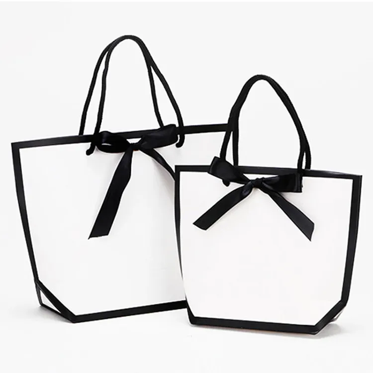 Sac cadeau à provisions en papier imprimé de luxe de haute qualité conception personnalisée avec poignée en ruban et nœud papillon sac à votre propre logo