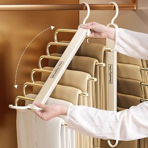 Colgador de ropa montado en la pared de plástico para ropa, organizador de armario plegable, almacenamiento de armario, perchas antideslizantes para pantalones para ropa - Product Image 1