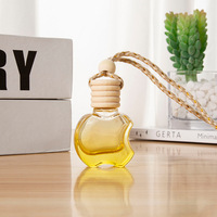 Vente en gros de diffuseurs de parfum pour voiture en forme de pomme, 8 ml, couleur dégradée, flacon vide avec bouchon en bois suspendu