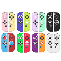 Commutateur de haute qualité boîtier en silicone interrupteur joycon contrôleur de jeu boîtier en silicone avec poignées de pouce