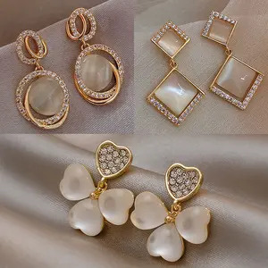 S925 argent aiguille géométrique opale diamant boucles d'oreilles coréennes avec trèfle fleurs cristal boucles d'oreilles tournesol boucles d'oreilles pour les femmes