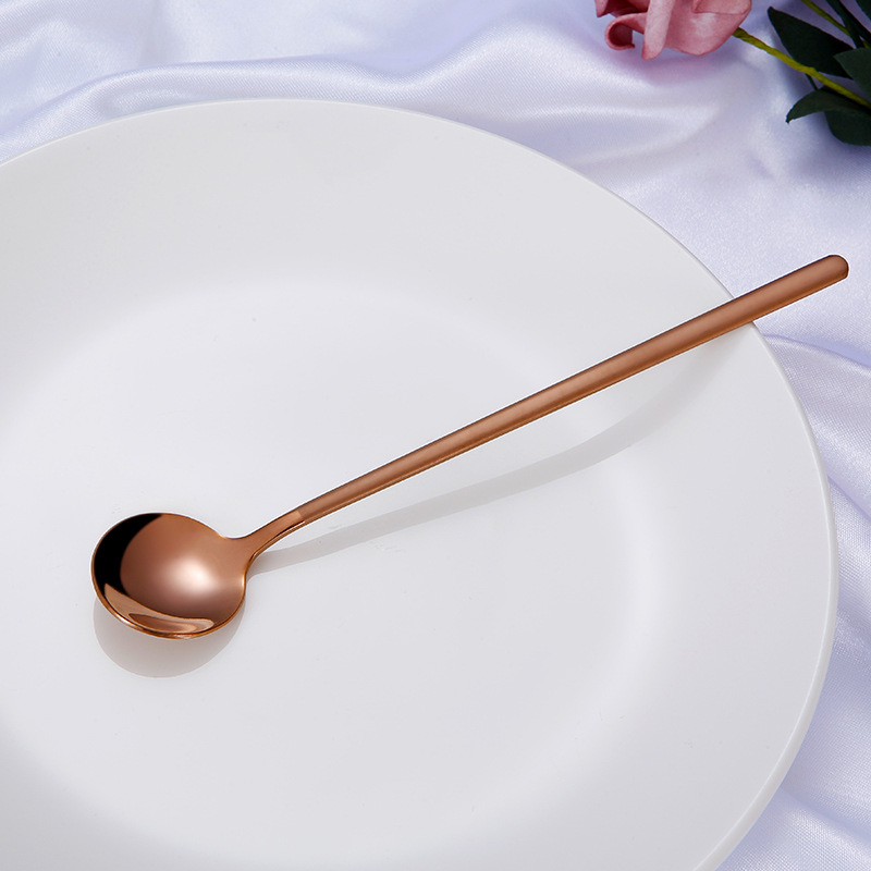 Cucchiaio lungo in oro rosa