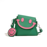 Sac à bandoulière en cuir PU tendance 2025, imperméable, avec fermeture éclair et doublure en polyester, motif visage souriant mignon pour femmes