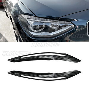Autocollants pour les sourcils des phares avant de voiture, aspect noir brillant/carbone, pour BMW Série 1 F20 F21 2011-2014 - Product Image 1