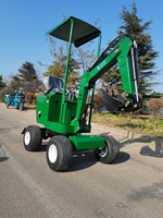 Kinger Penggali Roda Mesin, Loader Backhoe Mini Roda 4 Kecil Bergerak Bumi