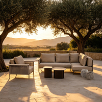 Ensemble de canapés modulaires d'extérieur en aluminium et corde tressée en forme de L avec table basse pour projets de patio d'hôtels de luxe modernes et villas de jardin