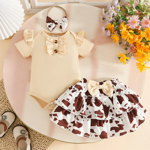 Set Estivo 2026 per Bambina 0-1 Anno, 3 Pezzi: Cappottino a Triangolo in Cotone a Maniche Corte + Gonna Stampata a Doppio Strato + Fascia per Capelli - Product Image 1