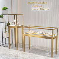 Vitrine à bijoux avec éclairage LED, support en métal et comptoir en verre pour vitrine de magasin