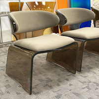 Fauteuil lounge de luxe nordique en acrylique sans accoudoirs, idéal pour hall d'hôtel, salon, café, ou projet d'aménagement intérieur.