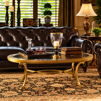 Canapé en cuir véritable de style Chesterfield haut de gamme avec accoudoirs roulés et capitonnés pour hôtel de luxe, villa, salon