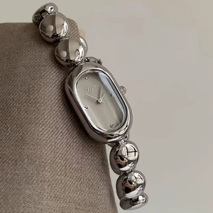 Montre ovale à quartz pour femme, style sport vintage de luxe Scottie, en alliage, avec bracelet en acier inoxydable et perles, élégante pour les tenues habillées. - Product Image 5