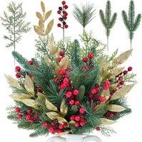 Branches de pin enneigées de Noël avec baies rouges pour couronnes, guirlandes, vases, décorations florales saisonnières d'hiver et centres de table festifs