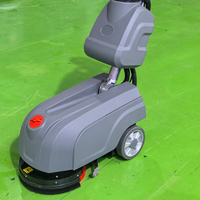 Nettoyeur de sols portatif compact et manuel, idéal pour les ateliers, les usines et l'usage commercial