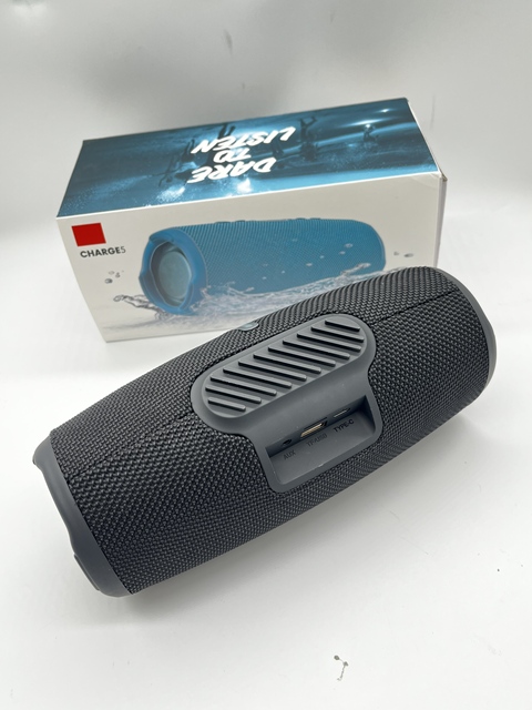 Meet the CHARGE5 - a Durable, Water-Resistant Bluetooth Speaker with Impressive Bass Output and a Convenient Built-in Card Slot
